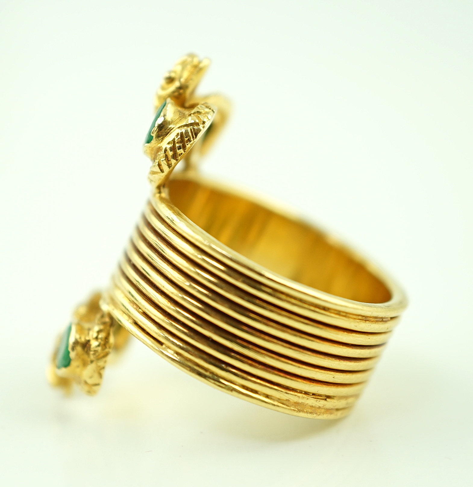 A Ilias Lalaounis 18k gold and four stone emerald set dress ring